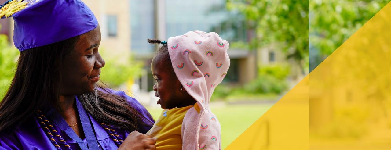 Student graduating and a child